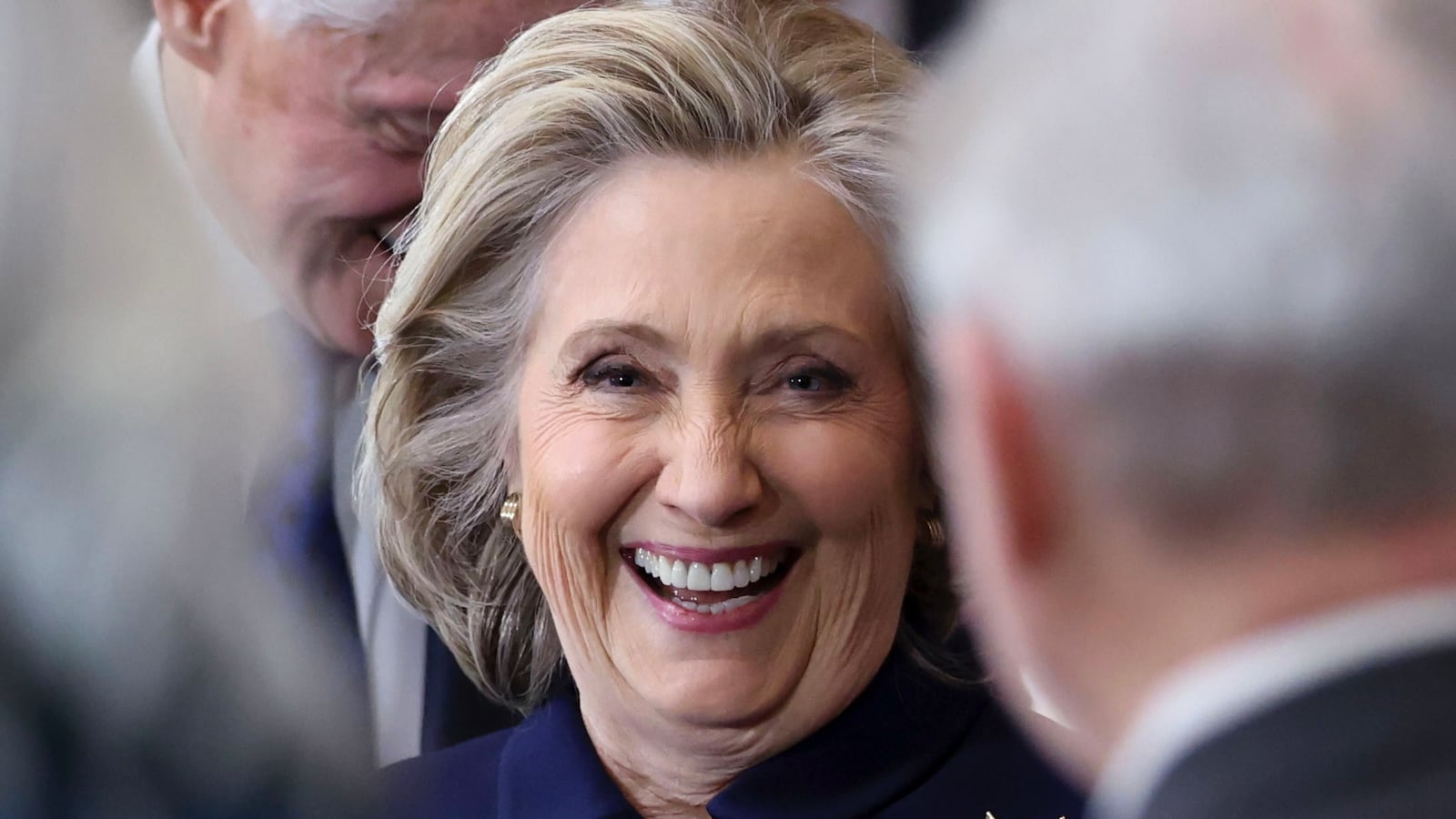 Hillary Clinton smiles at the 2025 inauguration of U.S. President-elect Donald Trump.