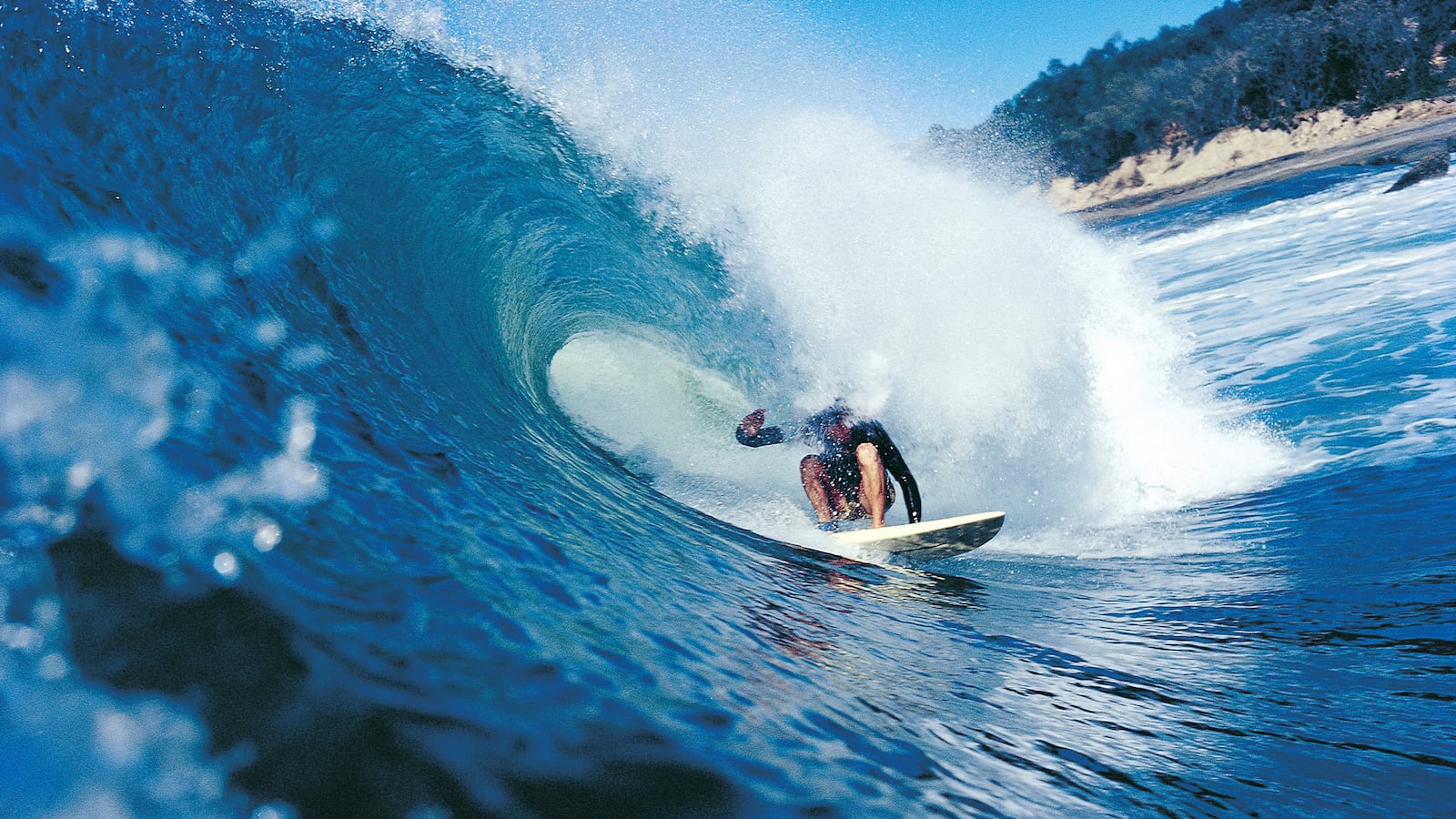 articles/2013/04/05/surfing-s-golden-age-john-witzig-and-his-groundbreaking-photos/001-gal-surfing-golden-age-tease_t64pmq