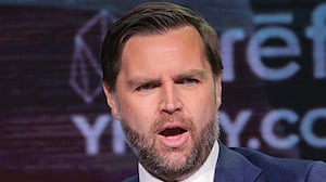 U.S. Vice President JD Vance (R) speaks with Turning Point USA spokesperson Andrew Kolvet during a Turning Point USA event at Akins Ford Arena at the Classic Center on April 14, 2026 in Athens, Georgia.