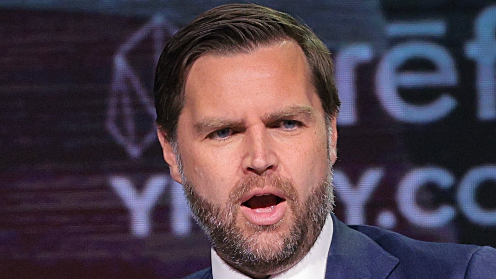 U.S. Vice President JD Vance (R) speaks with Turning Point USA spokesperson Andrew Kolvet during a Turning Point USA event at Akins Ford Arena at the Classic Center on April 14, 2026 in Athens, Georgia.