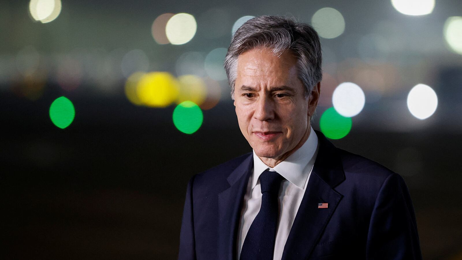 Secretary of State Antony Blinken looks on, as he begins to board his plane to travel home to Washington from Palam Air Base in New Delhi, India, Nov. 10, 2023.