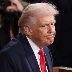 WASHINGTON, DC - FEBRUARY 24: U.S. President Donald Trump concludes his State of the Union address during a Joint Session of Congress at the U.S. Capitol on February 24, 2026, in Washington, DC. Trump delivered his address days after the Supreme Court struck down the administration's tariff strategy and amid a U.S. military buildup in the Persian Gulf threatening Iran. (Photo by Win McNamee/Getty Images)