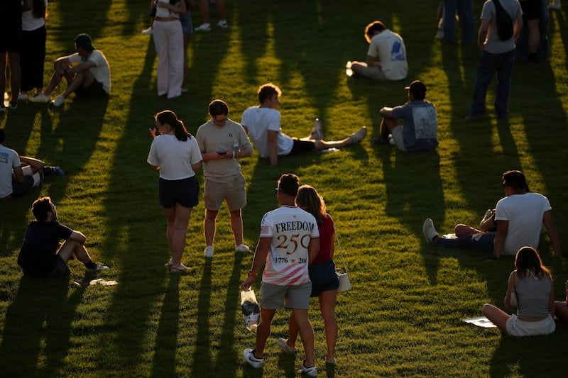 A person wears a "FREEDOM 250" shirt as people gather for a rally kicking off the Great American State Fair marking the 250th anniversary of U.S. independence, on the National Mall in Washington, D.C., U.S., June 24, 2026.