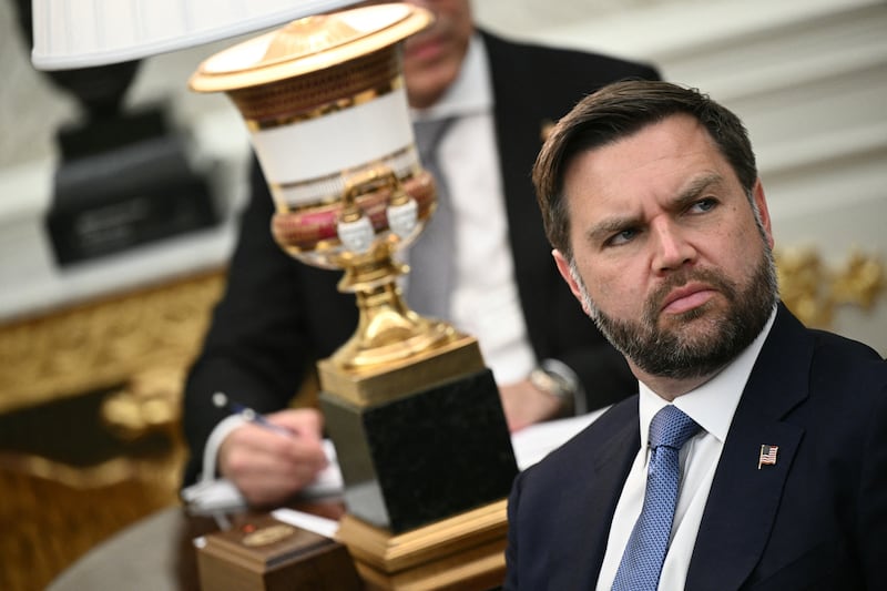 US Vice President JD Vance looks on during a meeting with US President Donald Trump and Crown Prince and Prime Minister of the Kingdom of Saudi Arabia Mohammed bin Salman in the Oval Office of the White House in Washington, DC on November 18, 2025.