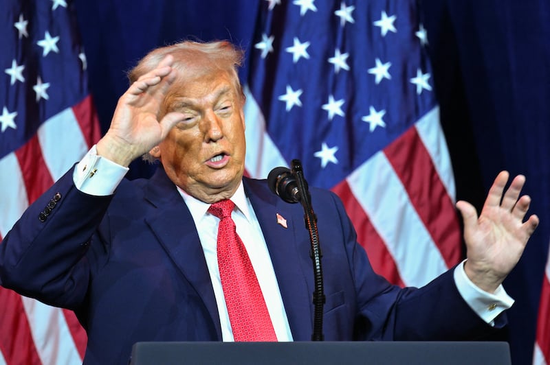 US President Donald Trump reacts as he speaks during the House Republican Party (GOP) member retreat at the Kennedy Center in Washington, DC, on January 6, 2026. (Photo by Mandel NGAN / AFP via Getty Images)