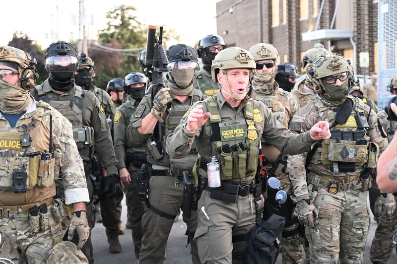 Border Patrol Chief Gregory Bovino of the El Centro Sector stands amid a protest outside an ICE facility in Broadview