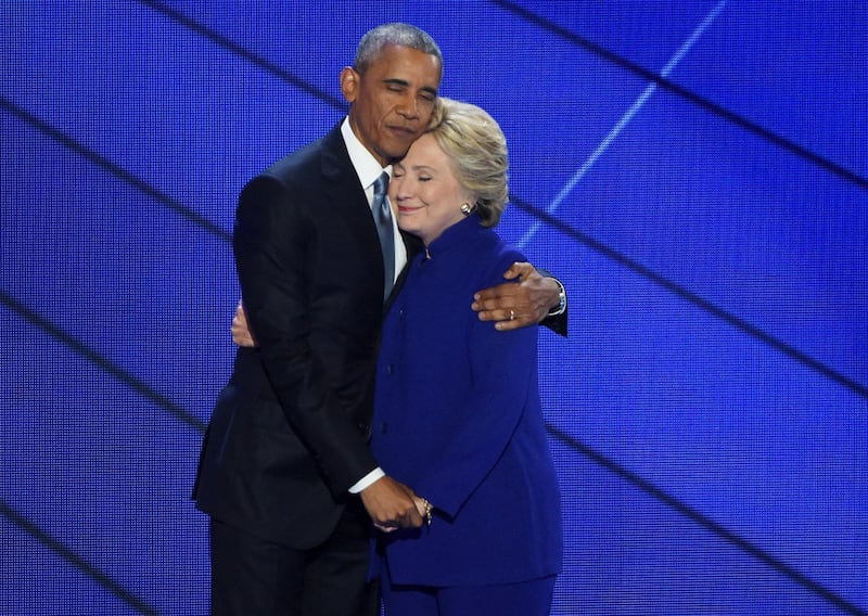 Philadelphia, PA: President Barack Obama and Hillary Clinton embrace on the stage after the speech by Obama at the Democratic National Convention at the Wells Fargo Center in Philadelphia, Pennsylvania on July 27, 2016. (Photo by Thomas A. Ferrara/Newsday RM via Getty Images)