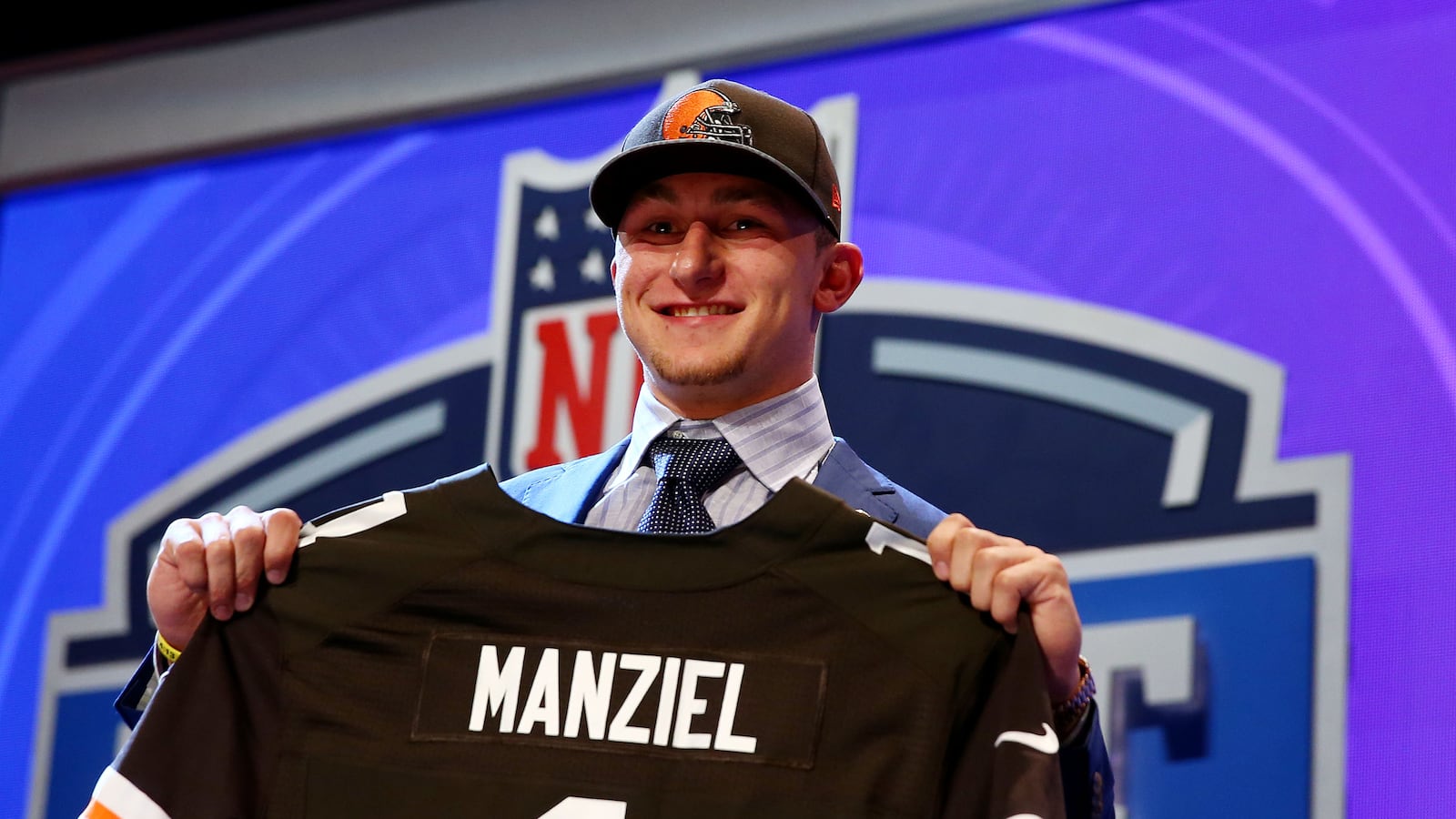 articles/2014/05/09/don-t-cry-for-johnny-football-the-nfl-s-22nd-pick-will-do-just-fine/140509-johnny-football-video-tease_zqcdwr
