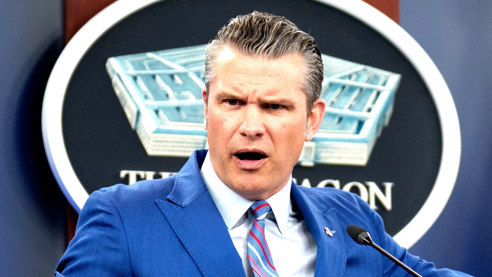 Defense Secretary Pete Hegseth (L), accompanied by Chairman of the Joint Chiefs of Staff Air Force Gen. Dan Caine (R), speaks during a news conference at the Pentagon on June 26, 2025 in Arlington, Virginia.