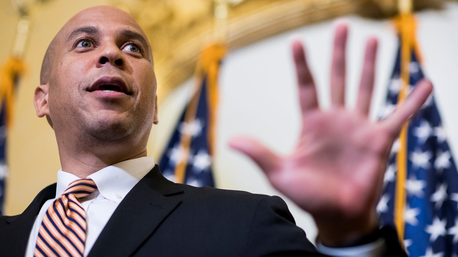 170809-Wolfe-corey-booker-tease_vlqvvb