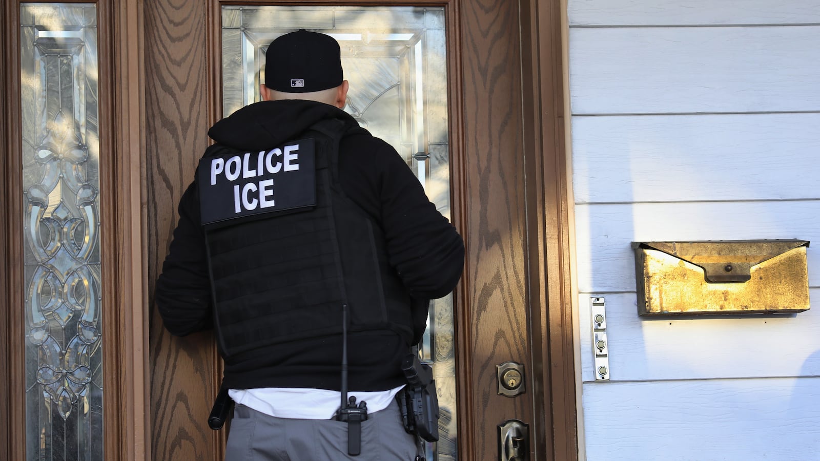 NEW YORK, NY - APRIL 11: U.S. Immigration and Customs Enforcement (ICE), officers arrive to a Flatbush Gardens home in search of an undocumented immigrant on April 11, 2018 in the Brooklyn borough of New York City. New York is considered a "sanctuary city" for undocumented immigrants, and ICE receives little or no cooperation from local law enforcement. ICE said that officers arrested 225 people for violation of immigration laws during the 6-day operation, the largest in New York City in recent years. (Photo by John Moore/Getty Images)