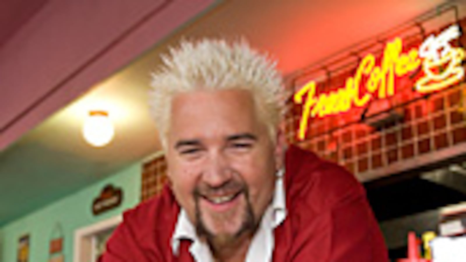 articles/2009/11/10/the-glenn-beck-of-food/syme-guy-fieri_61991_gf4rmv
