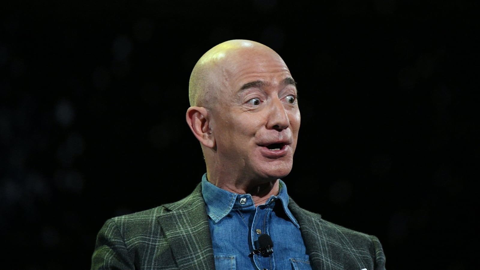 Jeff Bezos addresses the audience during a keynote session at the Amazon Re:MARS conference on robotics and artificial intelligence at the Aria Hotel in Las Vegas, Nevada on June 6, 2019.