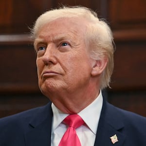US President Donald Trump looks on during an announcement of a $6.25 billion donation from Michael Dell, CEO of Dell Technologies and his wife Susan to "Trump Accounts," in the Roosevelt Room of the White House in Washington, DC on December 2, 2025.