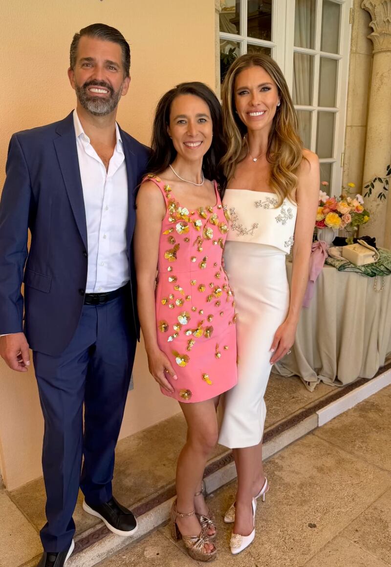 One lady rocked a pink dress with gold flowers stuck on it.