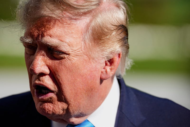 US President Donald Trump speaks with media before boarding Marine One as he travels to Grand Island, Nebraska, on the South Lawn of the White House in Washington, D.C., US, October 5, 2026. REUTERS/Eric Lee