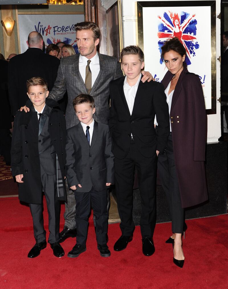 galleries/2013/05/16/let-us-reflect-on-david-beckham-s-hotness/130513-beckham-red-carpet-family_xiio41