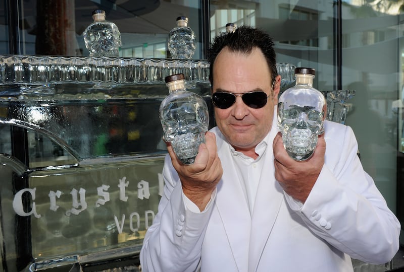 Actor and comedian Dan Aykroyd with his Crystal Head Vodka bottles at the Nikki Beach Grand Opening White Party in Las Vegas on May 26, 2011