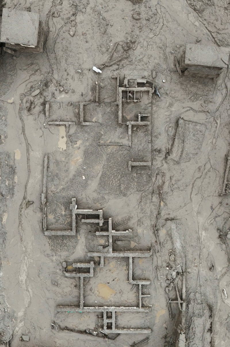 A drone view shows mud covering properties following a flash flood in Trishuli, Nuwakot district, Nepal, August 27, 2026. REUTERS/Navesh Chitrakar