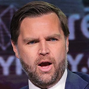 U.S. Vice President JD Vance (R) speaks with Turning Point USA spokesperson Andrew Kolvet during a Turning Point USA event at Akins Ford Arena at the Classic Center on April 14, 2026 in Athens, Georgia.