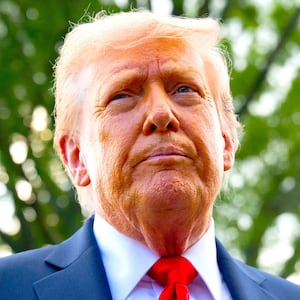 President Donald Trump speaks to the press before boarding Marine One prior to departing from the South Lawn of the White House in Washington, DC, on September 11, 2025.