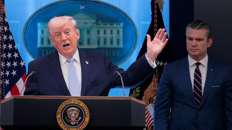 U.S. President Donald Trump holds a press conference accompanied by U.S. Secretary of Defense Pete Hegseth in the James S. Brady Press Briefing Room at the White House in Washington, D.C., U.S., April 6, 2026. REUTERS/Evan Vucci