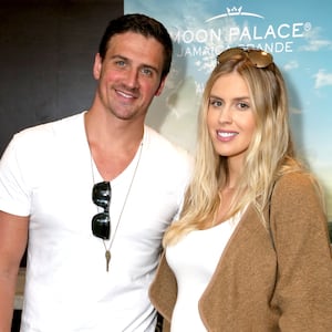 Ryan Lochte (L) and Kayla Rae Reid