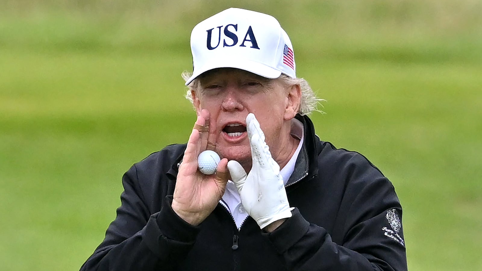 US President Donald Trump reacts as he plays golf at the Trump Turnberry Golf Courses, in Turnberry on the south west coast of Scotland on July 27, 2025, during the third day of his visit to the country, since his second tenure as President began. Trump and EU chief Ursula von der Leyen are set to meet later on July 27, in a decisive push to resolve a months-long transatlantic trade standoff with the US leader putting the chances of a deal at one in two. (Photo by ANDY BUCHANAN / AFP) (Photo by ANDY BUCHANAN/AFP via Getty Images)