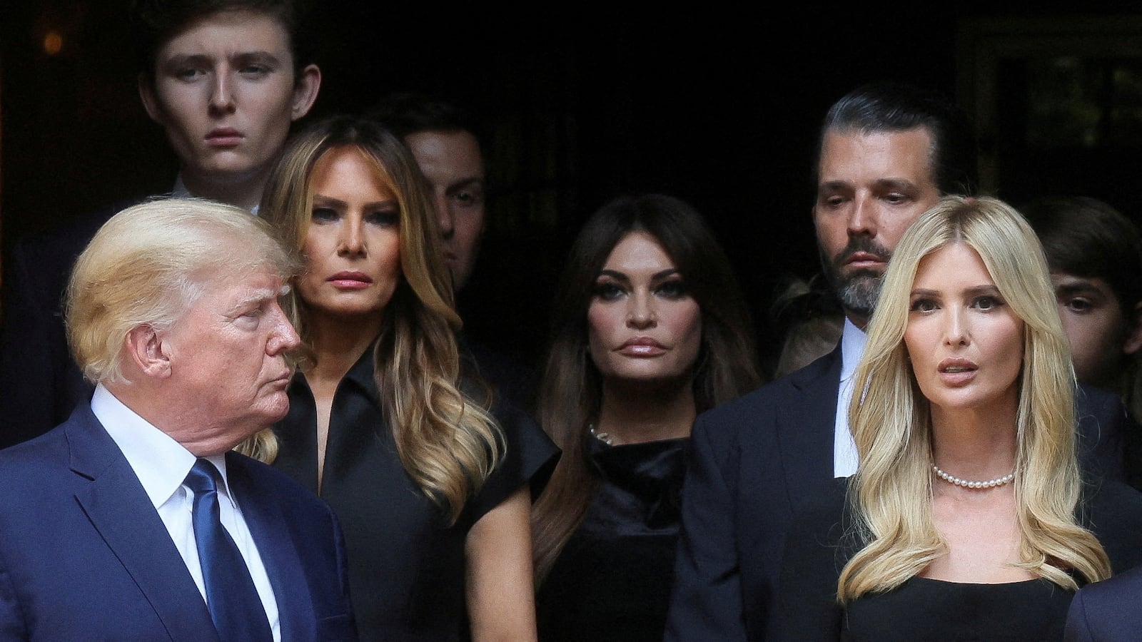 Former U.S. President Donald Trump, his wife Melania, Kimberly Guilfoyle, his sons Barron and Donald Jr. and his daughter Ivanka leave St. Vincent Ferrer Church during the funeral of Ivana Trump.