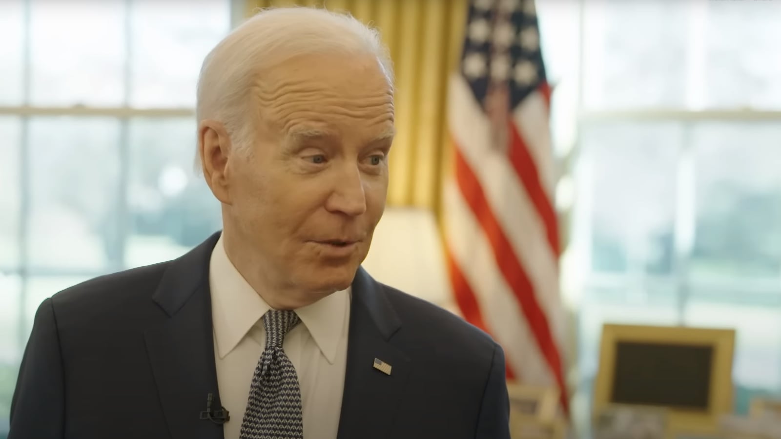 Biden gives Kal Penn a tour of the Oval Office.