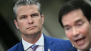 Defense Secretary Pete Hegseth looks on as Secretary of State Marco Rubio speak to the media before he forced him aside to yell at a reporter from CNN.