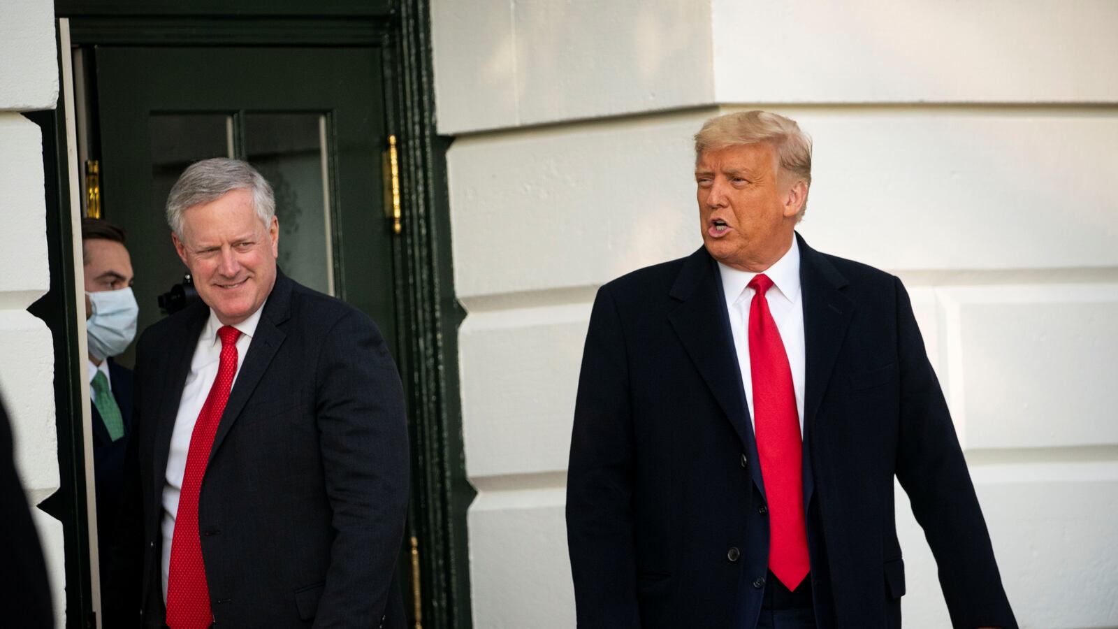 Donald Trump and Mark Meadows exit the White House.