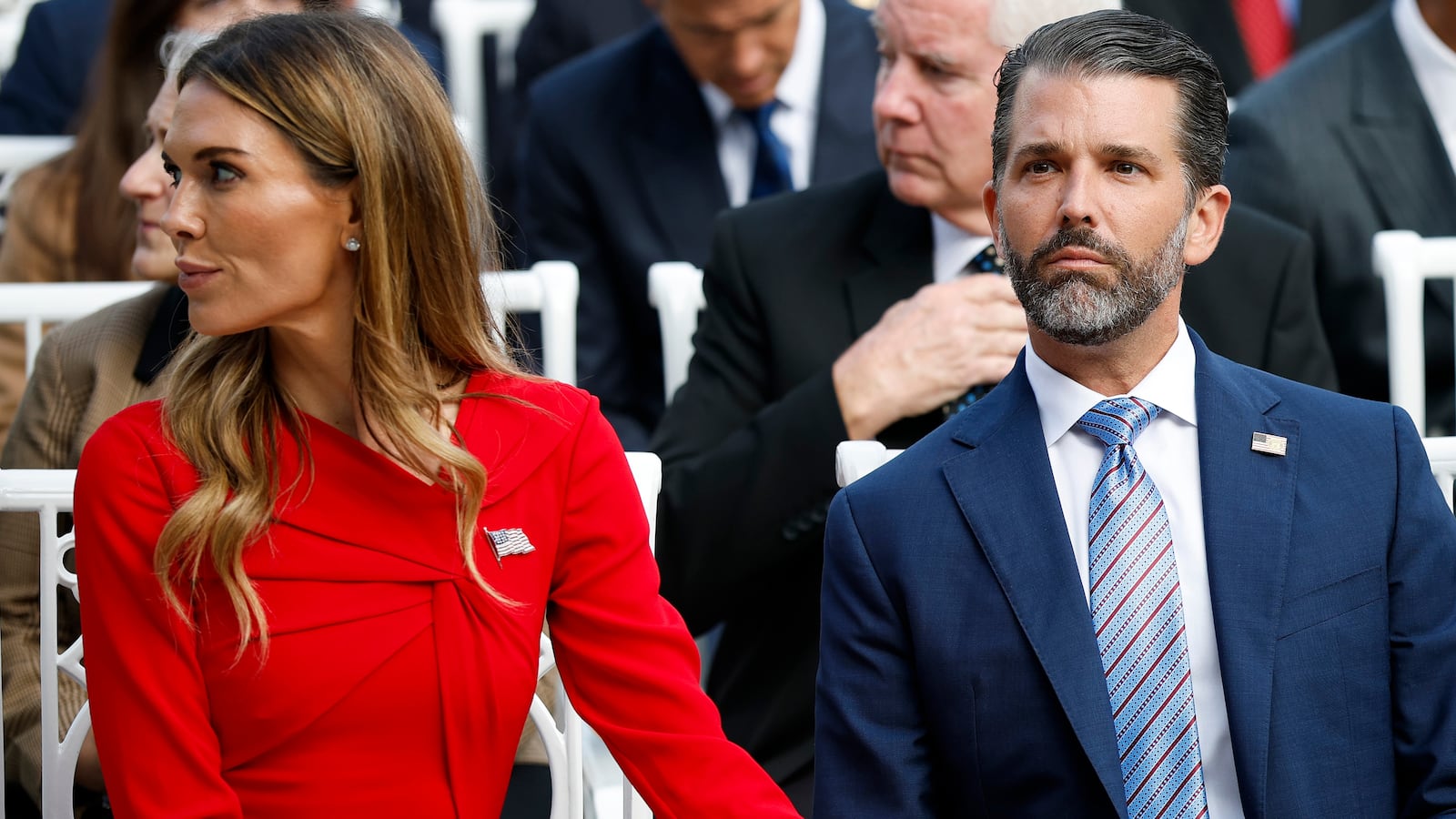 Donald Trump Jr. (R) sits with his girlfriend Bettina Anderson.