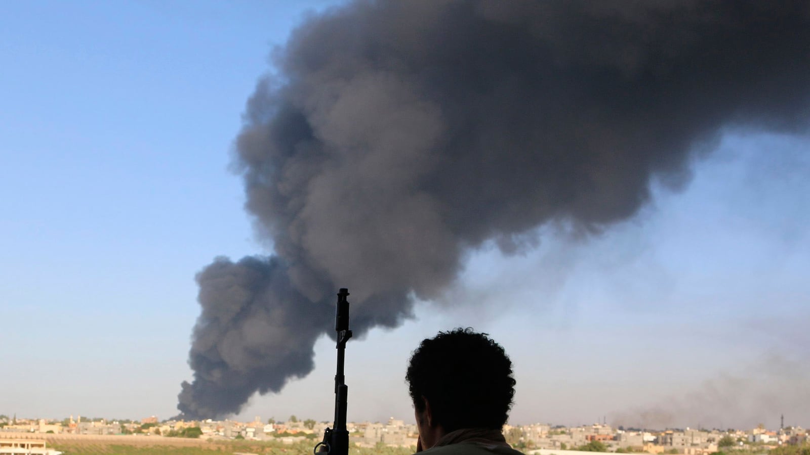 articles/2014/08/07/libya-requiem-for-a-revolution/140806-dettmer-libya-tease_zfyr3n