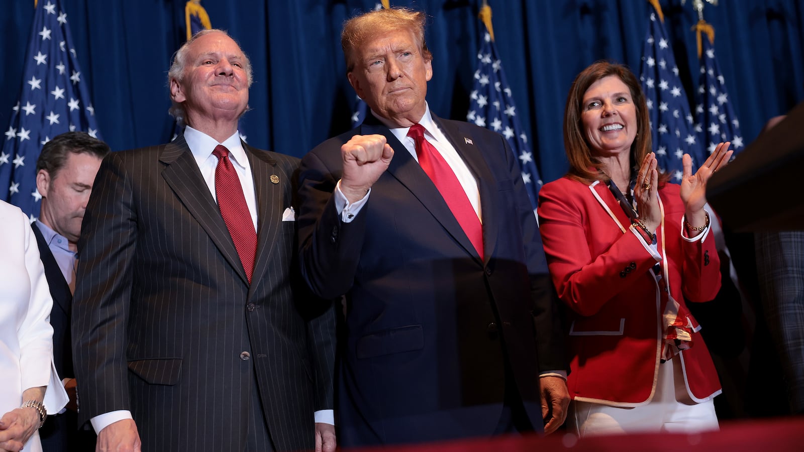 Republican presidential candidate and former President Donald Trump walks on stage to speak during an election night watch party at the State Fairgrounds on February 24, 2024.