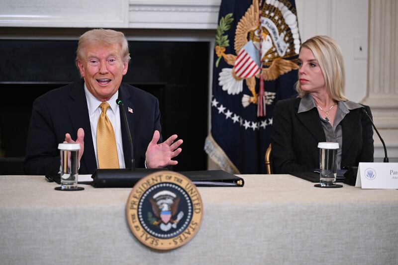 President Donald Trump and Attorney General Pam Bondi take part in a roundtable event