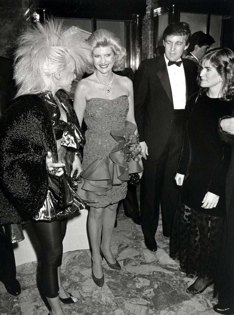 High Voltage (also known as Kathie Dolgin), Ivana Trump, and Donald Trump during Donald Trump Celebrates His Book "The Art of The Deal" at Trump Towers Atrium in New York City, New York, United States. (Photo by Ron Galella/Ron Galella Collection via Getty Images)