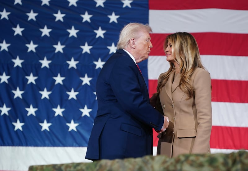 FORT BRAGG, NORTH CAROLINA - FEBRUARY 13: U.S. President Donald Trump and first lady Melania Trump visit the Fort Bragg U.S. Army base on February 13, 2026 in Fort Bragg, North Carolina. Trump visited the base to honor special forces involved in the military operation in Venezuela in early 2026. (Photo by Nathan Howard/Getty Images)