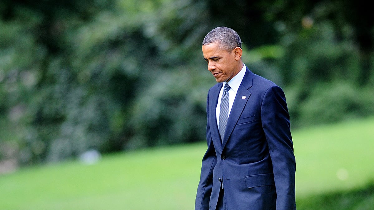 articles/2012/08/14/barack-obama-beating-mitt-romney-in-confidence-game-but-will-likely-lose-election/sad-obama-cheat_wkiutd