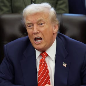 President Donald Trump ranted at CNN's Kaitlan Collins for not smiling when she tried to ask him about Epstein survivors in the Oval Office on February 03, 2026.