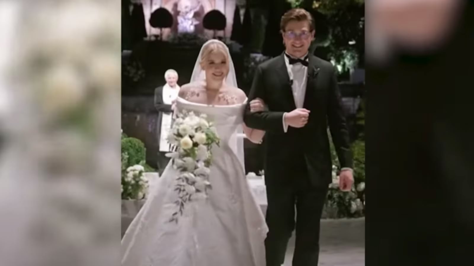 Madelaine Brockway and Jacob LaGrone walk down the aisle at their $59 million wedding at a chateau outside Paris.