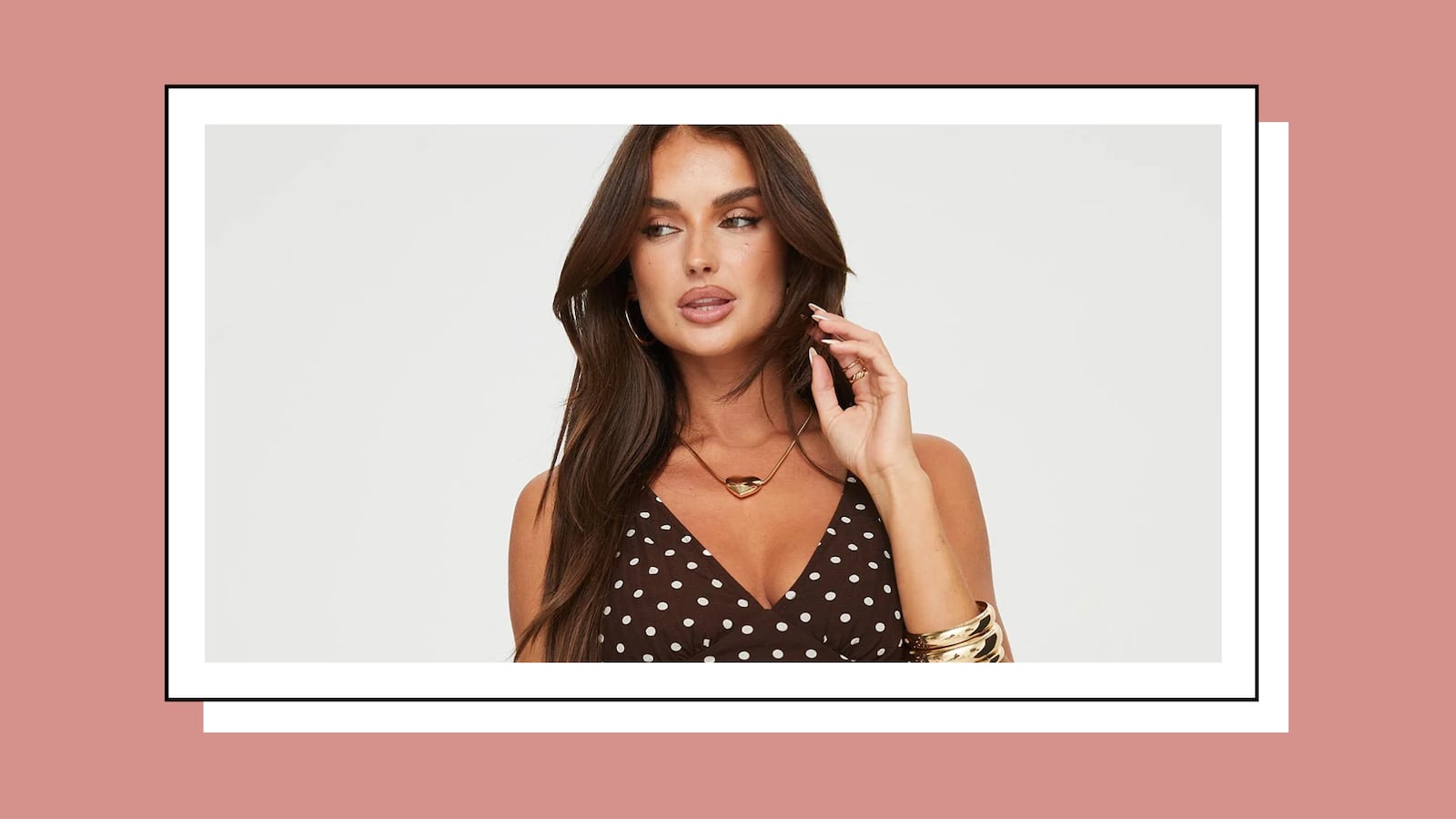 Model wearing Princess Polly Nellie Mini Dress in brown polka dot pattern with gold jewelry, close-up shot highlighting neckline and accessories.