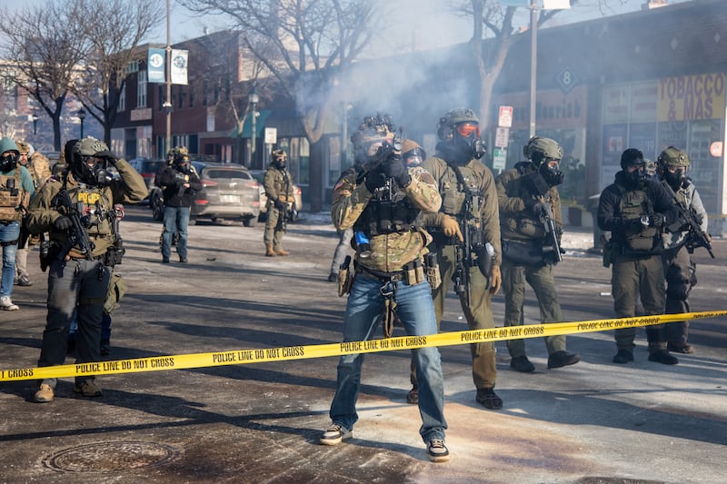 MINNEAPOLIS, UNITED STATES - JANUARY 24: Protesters clash with law enforcement after a federal agent shot and killed a man on Jan. 24 â" the second federal-involved shooting in the city this month, deepening tensions over enforcement operations in Minneapolis, United States, on January 24, 2026. (Photo by Arthur Maiorella/Anadolu via Getty Images)