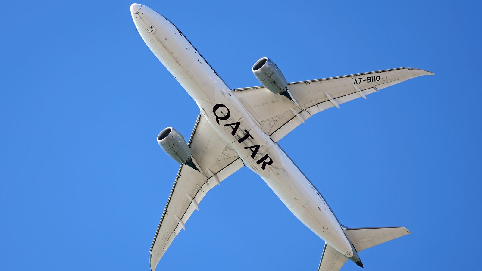 A Qatar Airways Boeing 787-9 Dreamliner is in flight in Barcelona, Spain, on April 1, 2025.