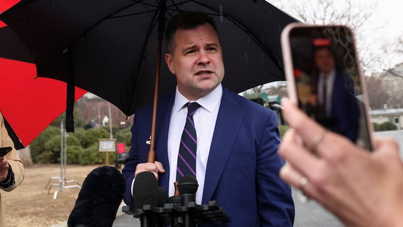 A reporter films with her phone as U.S. Federal Housing Finance Agency Director Bill Pulte speaks at the White House in Washington, D.C., U.S., January 9, 2026.  REUTERS/Kevin Lamarque