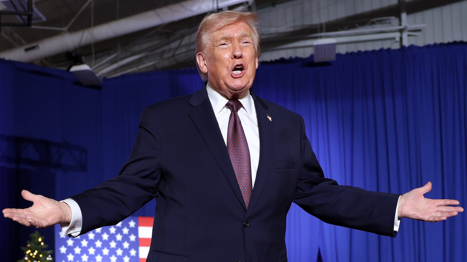 ROCKY MOUNT, NORTH CAROLINA - DECEMBER 19: U.S. President Donald Trump takes the stage during a rally at the Rocky Mount Event Center on December 19, 2025 in Rocky Mount, North Carolina. Trump spoke on his plans to lower the cost of staples, including gas and health care, while blaming the Biden administration for the economic challenges inherited by his administration. (Photo by Tasos Katopodis/Getty Images)