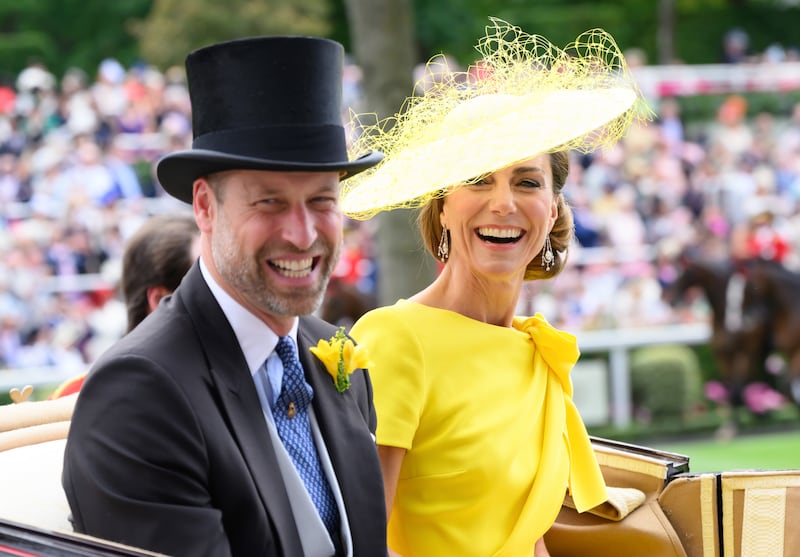 ASCOT, ENGLAND - JUNE 17: Prince William, Prince of Wales and Catherine, Princess of Wales laugh as they attend day two of Royal Ascot 2026 at Ascot Racecourse on June 17, 2026 in Ascot, England. (Photo by Karwai Tang/WireImage)