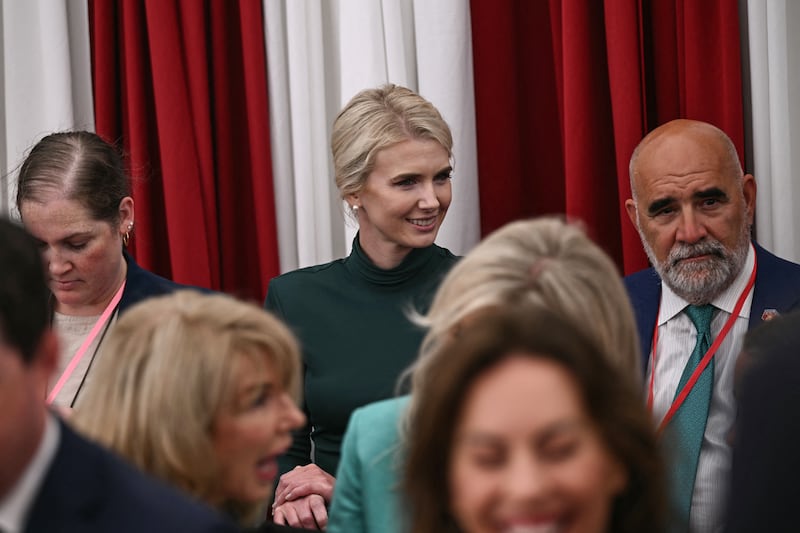 White House Appointments Secretary Natalie Harp (C) attends a welcome function for US President Donald Trump at the US ambassador's residence in the Irish capital Dublin on September 12, 2026. Trump arrived in Ireland on September 12 for a two-day visit, stopping for a few hours in Dublin before heading west to his Trump International Golf Links to attend the Irish Open. (Photo by Brendan SMIALOWSKI / AFP via Getty Images)