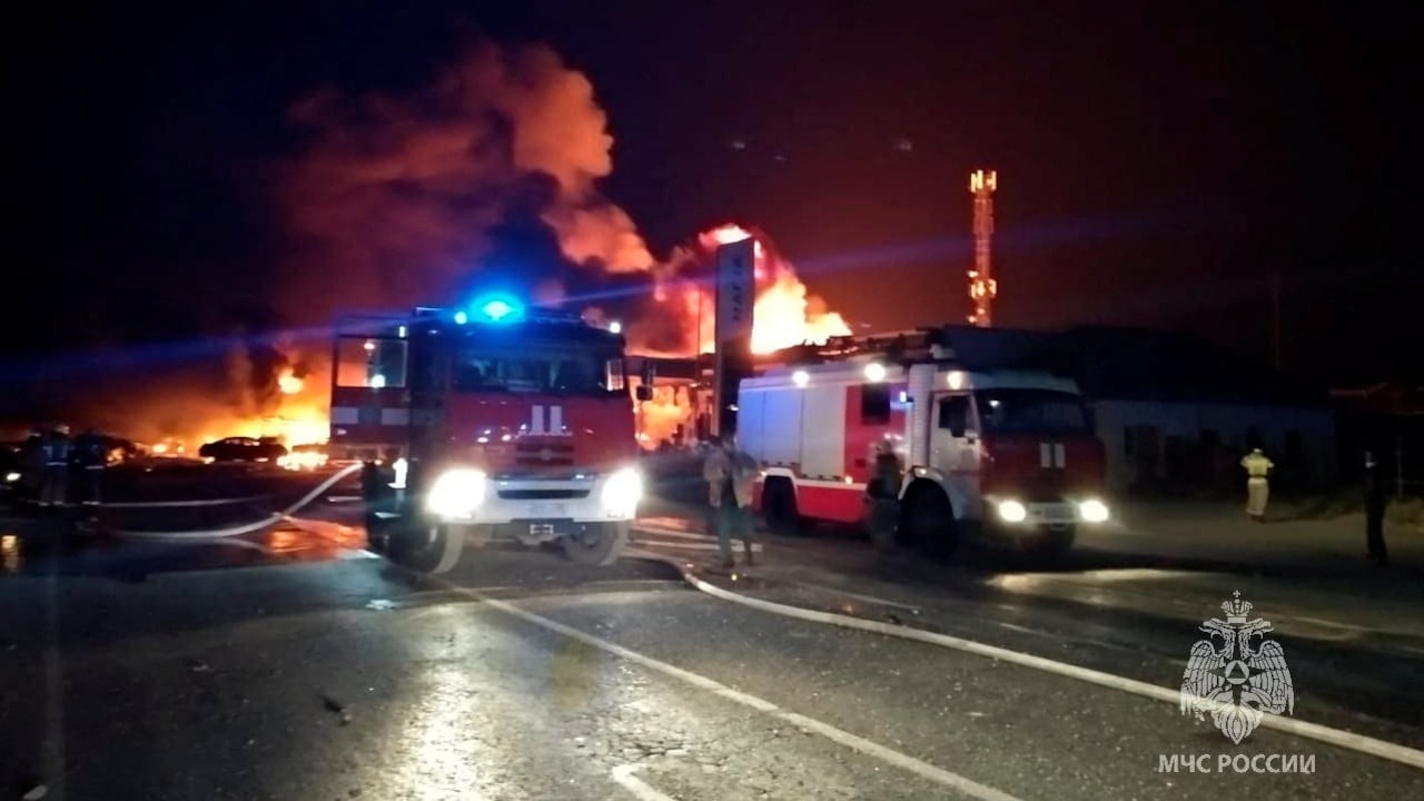 A view shows firefighting vehicles at the accident scene following an explosion at a gas station in the city of Makhachkala, Russia, August 14, 2023.