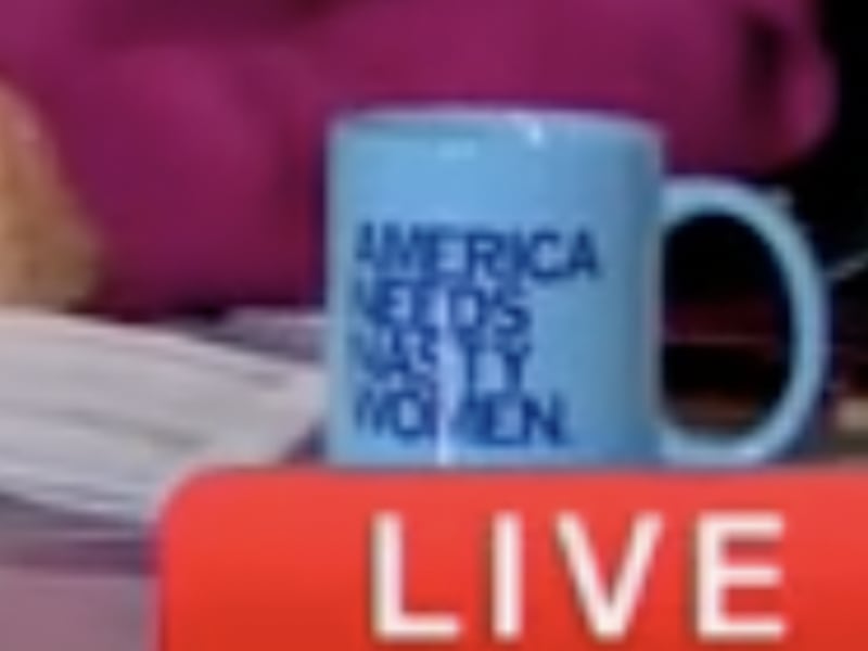 Kaitlin Collins with her new mug.